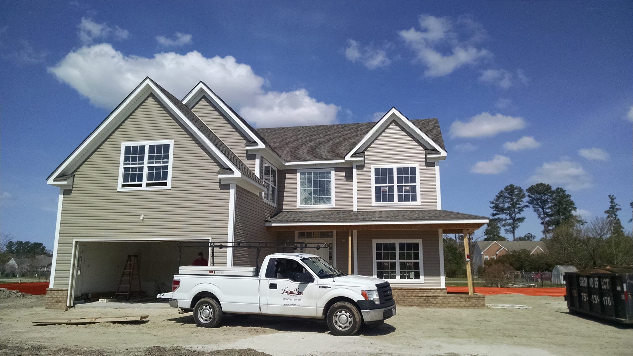 New garage doors on a new, modern house